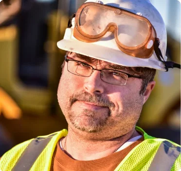 Construction worker wearing safety glasses