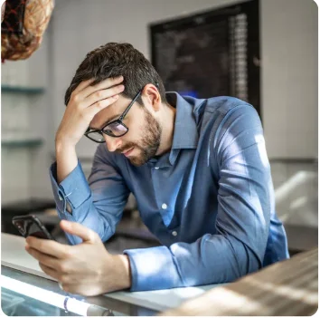 Person stressed over insurance claims